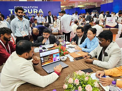 Delegates at business meeting tables in the Destination Tripura Business Conclave 2026 hall