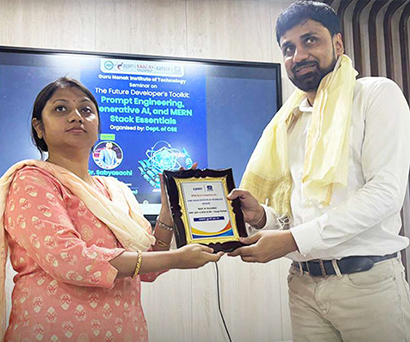 Dr. Sabyasachi Saha receiving a memento at Guru Nanak Institute of Technology